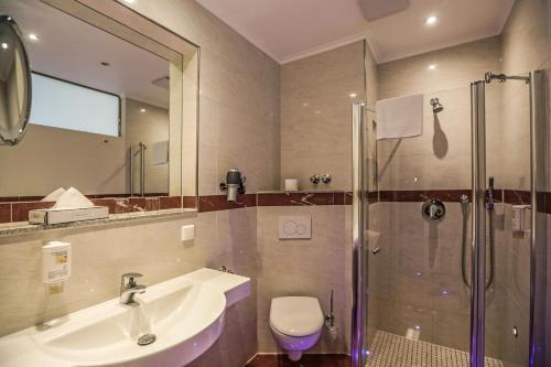 Koupelna v ubytování Hotel Mack Private Inn