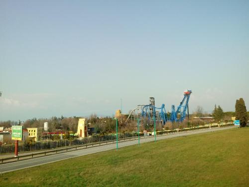 a roller coaster on the side of a road at La Maison du Port in Lazise