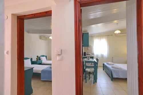 Un ou plusieurs lits dans un hébergement de l'établissement ANTONIOS Skopelos studios apartments