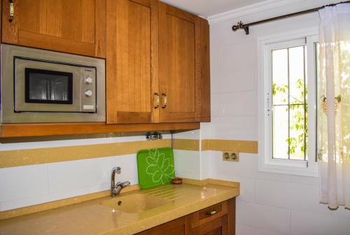 Kuchyňa alebo kuchynka v ubytovaní Apartamento Barrosaplaya1