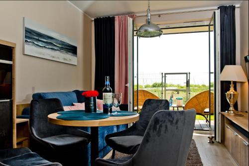Ruang duduk di BlueApart Apartamenty Na Plaży Jastarnia