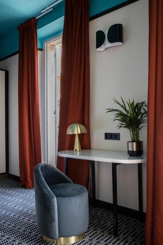 TV a/nebo společenská místnost v ubytování Best Western Premier Hotel Roosevelt