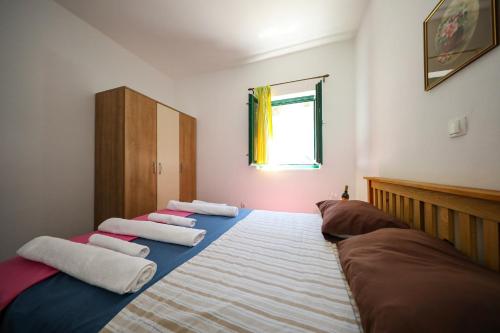 Postel nebo postele na pokoji v ubytování Apartment Corto