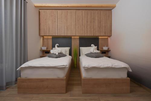 Voodi või voodid majutusasutuse Chalet Zana toas