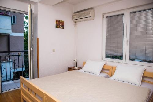 Katil atau katil-katil dalam bilik di Central Apartment Ohrid