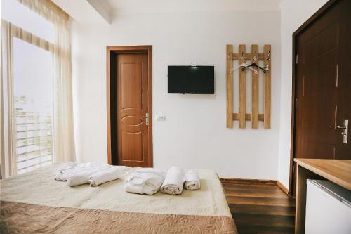 Postel nebo postele na pokoji v ubytování Balanchine