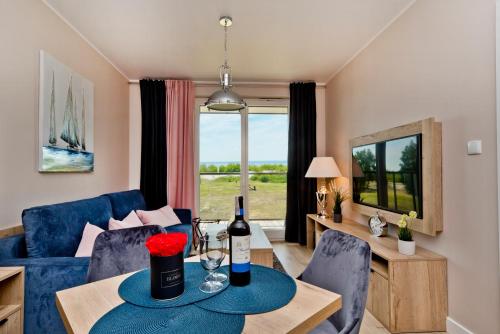 Ruang duduk di BlueApart Apartamenty Na Plaży Jastarnia