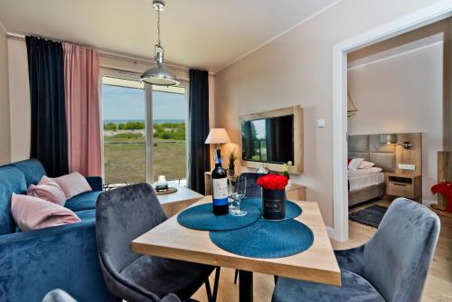 Televisyen dan/atau pusat hiburan di BlueApart Apartamenty Na Plaży Jastarnia