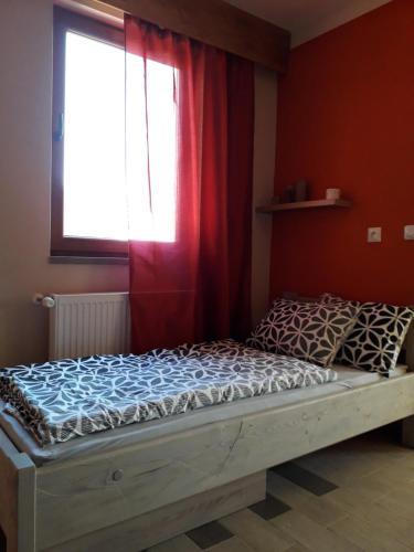 Cama ou camas em um quarto em Apartman Na Horách