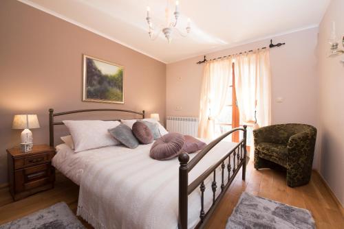 Ένα ή περισσότερα κρεβάτια σε δωμάτιο στο Guest House Rabenseifner - Opatija