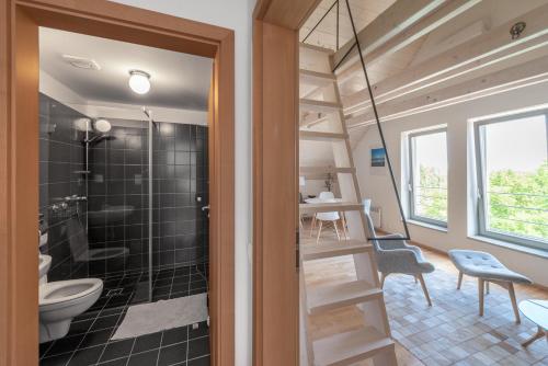 Koupelna v ubytování Apartmán se sklípkem
