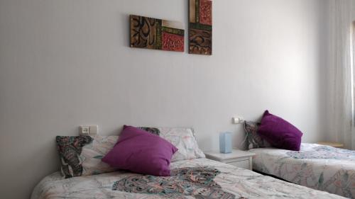 Säng eller sängar i ett rum på Apartamento centro y Playa Costa Brava y Barcelona