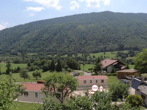 a view of a valley with a mountain in the background at Apartments Denis in Tolmin