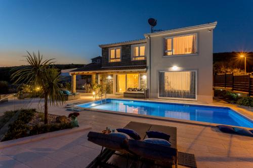 HILLSIDE villa with sea view and pool