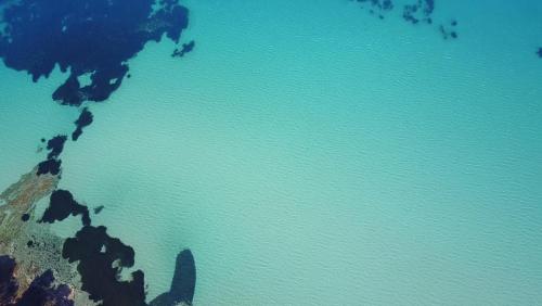 an aerial view of a large body of water at Perfect Suites in Neos Marmaras