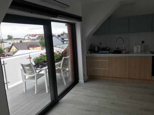 Η κουζίνα ή μικρή κουζίνα στο Apartament Promenada