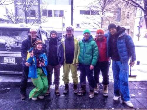 a group of people posing for a picture in the snow at Asahikawa Ride in Asahikawa