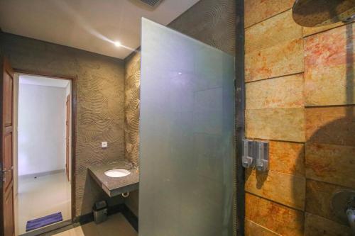 Ένα μπάνιο στο Aji Lodge Bungalow