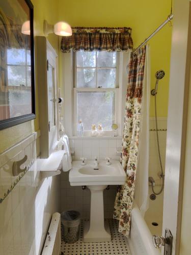 a bathroom with a sink and a window at The Inn on Knowles Hill Bed & Breakfast Hotel in Sonora