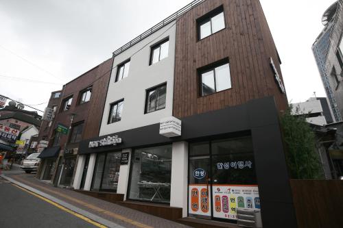 a building on the side of a street at Moon Sun Guesthouse in Seoul