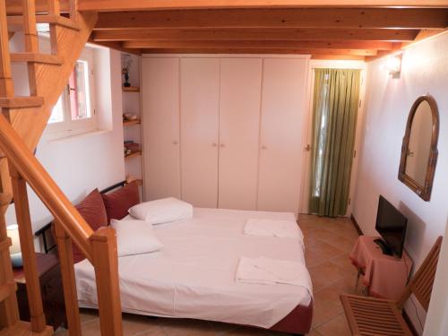 Posteľ alebo postele v izbe v ubytovaní Stone house