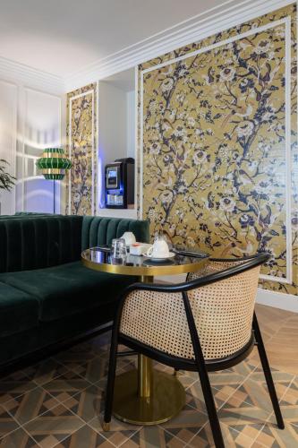 TV a/nebo společenská místnost v ubytování Best Western Premier Hotel Roosevelt