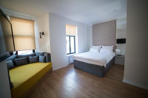 Postel nebo postele na pokoji v ubytování D&K apartments