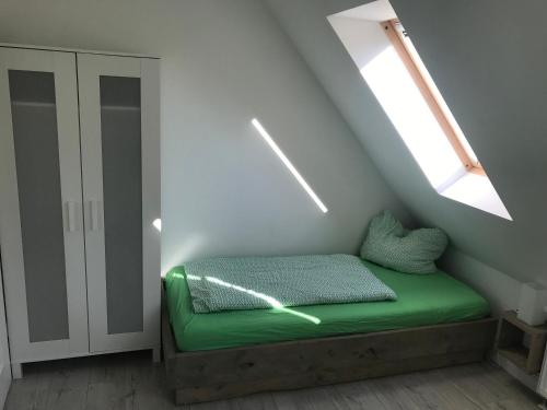 Ένα ή περισσότερα κρεβάτια σε δωμάτιο στο Haus Amelie