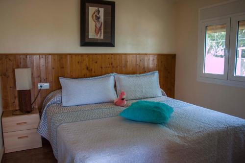 Ένα ή περισσότερα κρεβάτια σε δωμάτιο στο Casa Rural Delta del Ebro Paradise Ebro 1