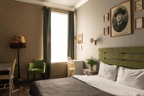 Кровать или кровати в номере Отель Offenbacher