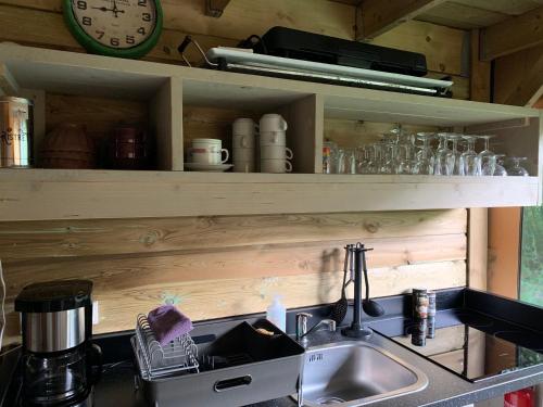 Kuchyň nebo kuchyňský kout v ubytování Ecolodge Beauregard