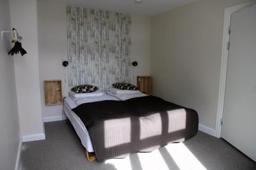 Cama o camas de una habitación en Stevns Klint Strandpension