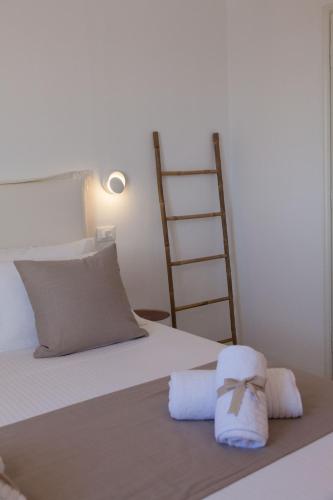 Katil atau katil-katil dalam bilik di Astarte Luxury Apartments