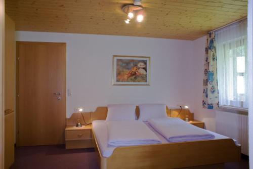 Postel nebo postele na pokoji v ubytování Haus Bials