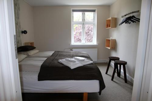 Postel nebo postele na pokoji v ubytování Stevns Klint Strandpension