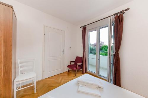 Posteľ alebo postele v izbe v ubytovaní Seaside Villa Mia Trogir