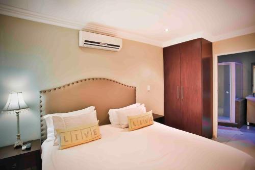 Katil atau katil-katil dalam bilik di Accommodation at Vans No Loadshedding