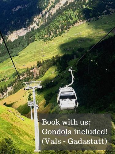 a car on a ski lift in the mountains at Hotel Alpina in Vals