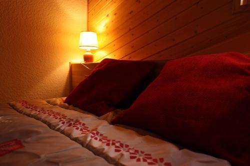 Postel nebo postele na pokoji v ubytování Le Duplex d'Aussois