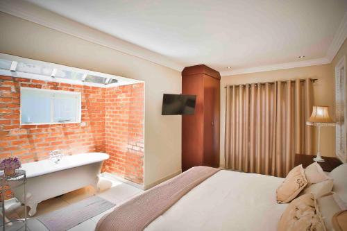 Katil atau katil-katil dalam bilik di Accommodation at Vans No Loadshedding