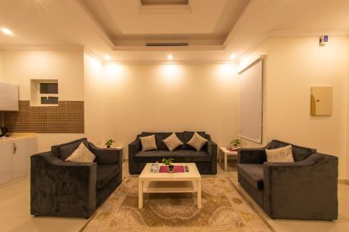 Χώρος καθιστικού στο Diafa Saadet Serviced Apartments-Panda Alfayha