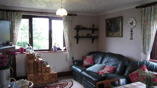 Heathergate Cottage Dartmoor BnBにあるシーティングエリア