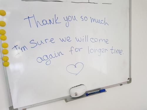 a whiteboard with a handwritten thank you sign on it at Apartment Dolce Vita in Celje