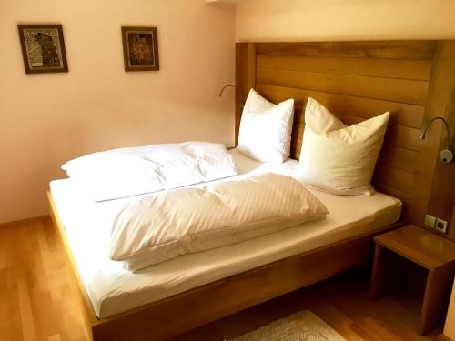 Ein Bett oder Betten in einem Zimmer der Unterkunft Schlößlesmühle