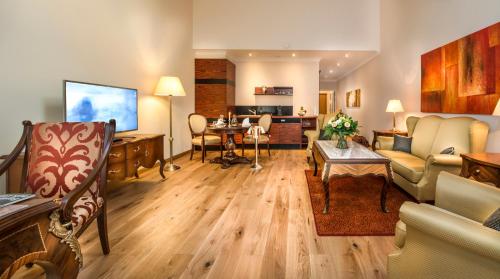 a living room with a couch and a table at Residence Bellevue in Boppard