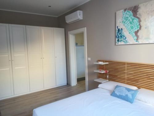 Posteľ alebo postele v izbe v ubytovaní 9 House Ortigia