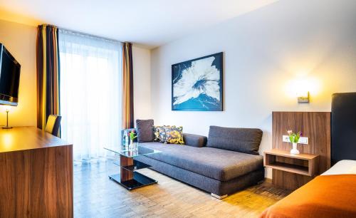 Гостиная зона в Schroeders Stadtwaldhotel
