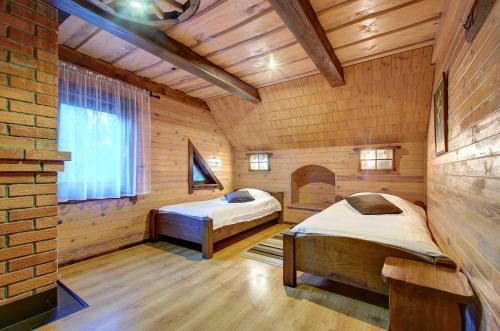 Tempat tidur dalam kamar di Prie Klykio Manor