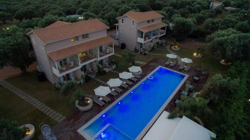 an aerial view of a house with a swimming pool at Summer Dream Lefkas in Lefkada Town