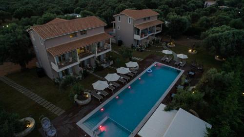 an aerial view of a house with a swimming pool at Summer Dream Lefkas in Lefkada Town